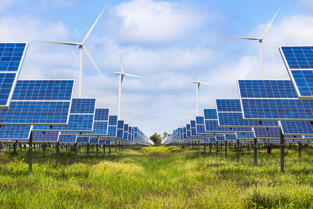 Photovoltaics,And,Wind,Turbines,Generating,Electricity,In,Solar,Farm,Station